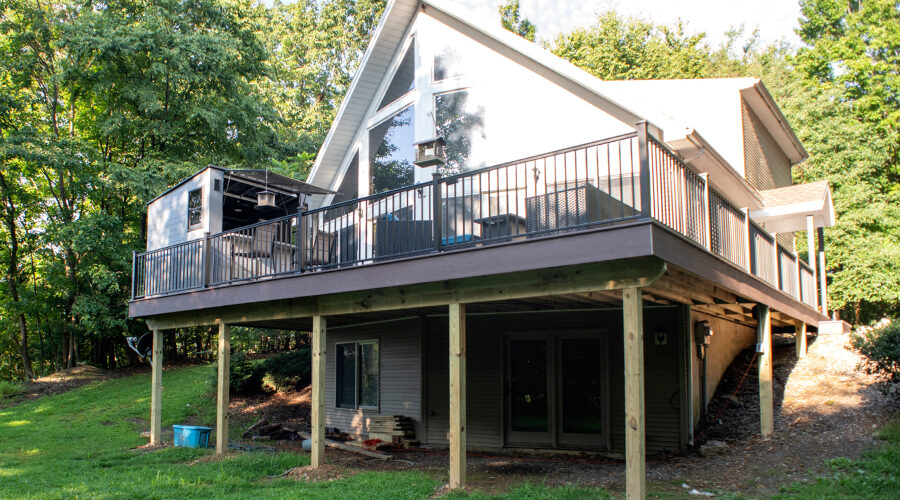renovated deck with kona flooring and black railings