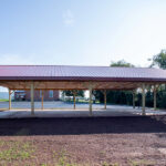 side view of pavilion with a red roof