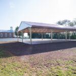 side view of new pavilion next to a church