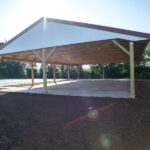 new pavilion with red roof and white side walls