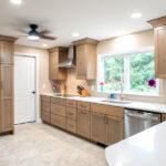 sink, stove, and dishwasher in renovated kitchen