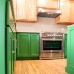 custom green kitchen cabinets with stove