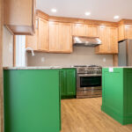 custom green kitchen cabinets